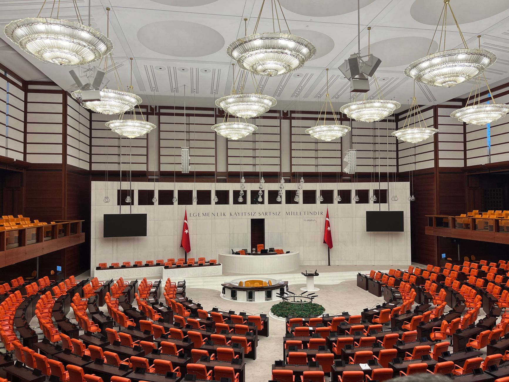 Wide view of the Turkish Parliament interior in Ankara showcasing its modern design and grand architecture.