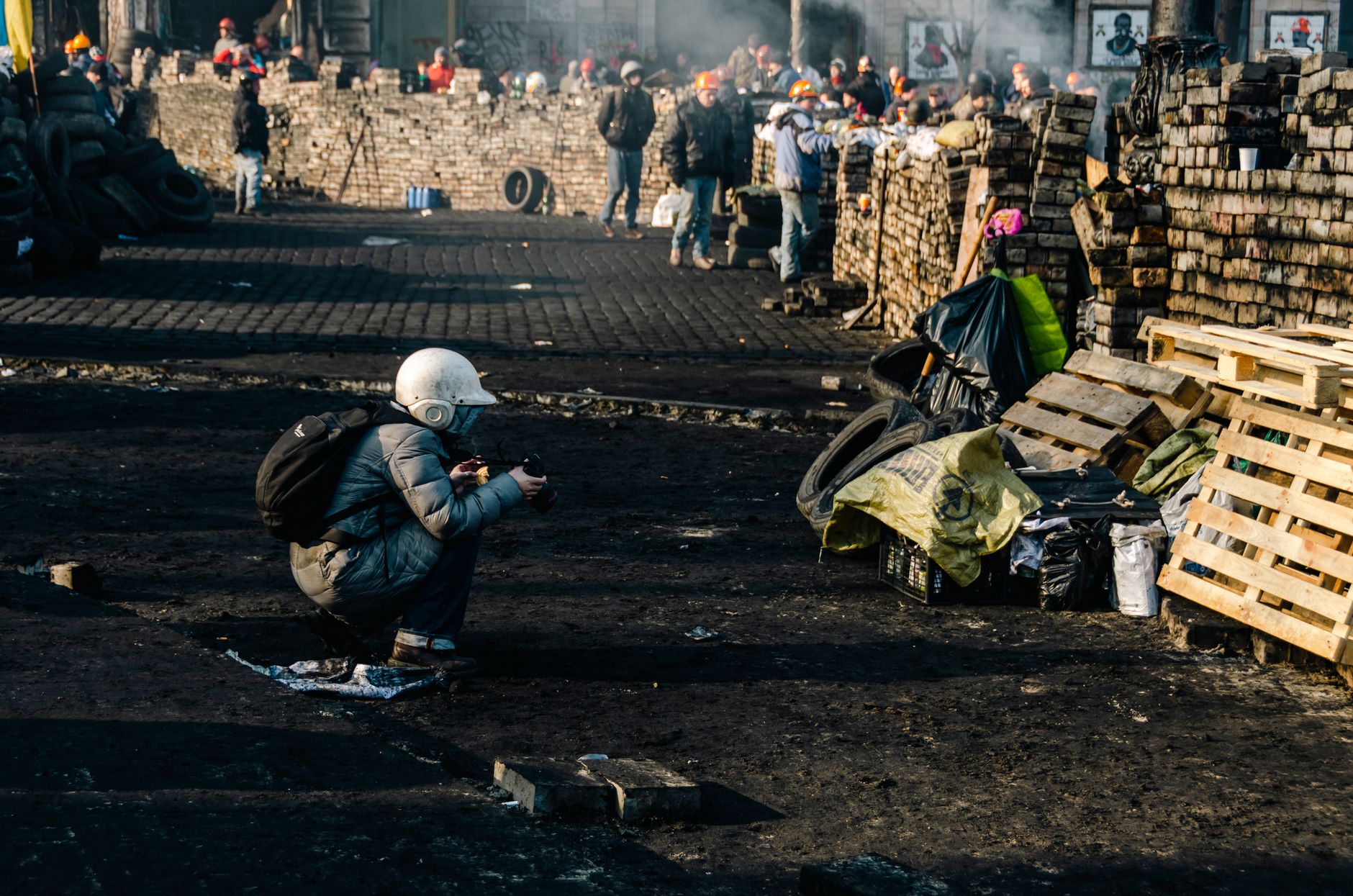 A vibrant street scene in Kyiv depicting a political protest with demonstrators in action.