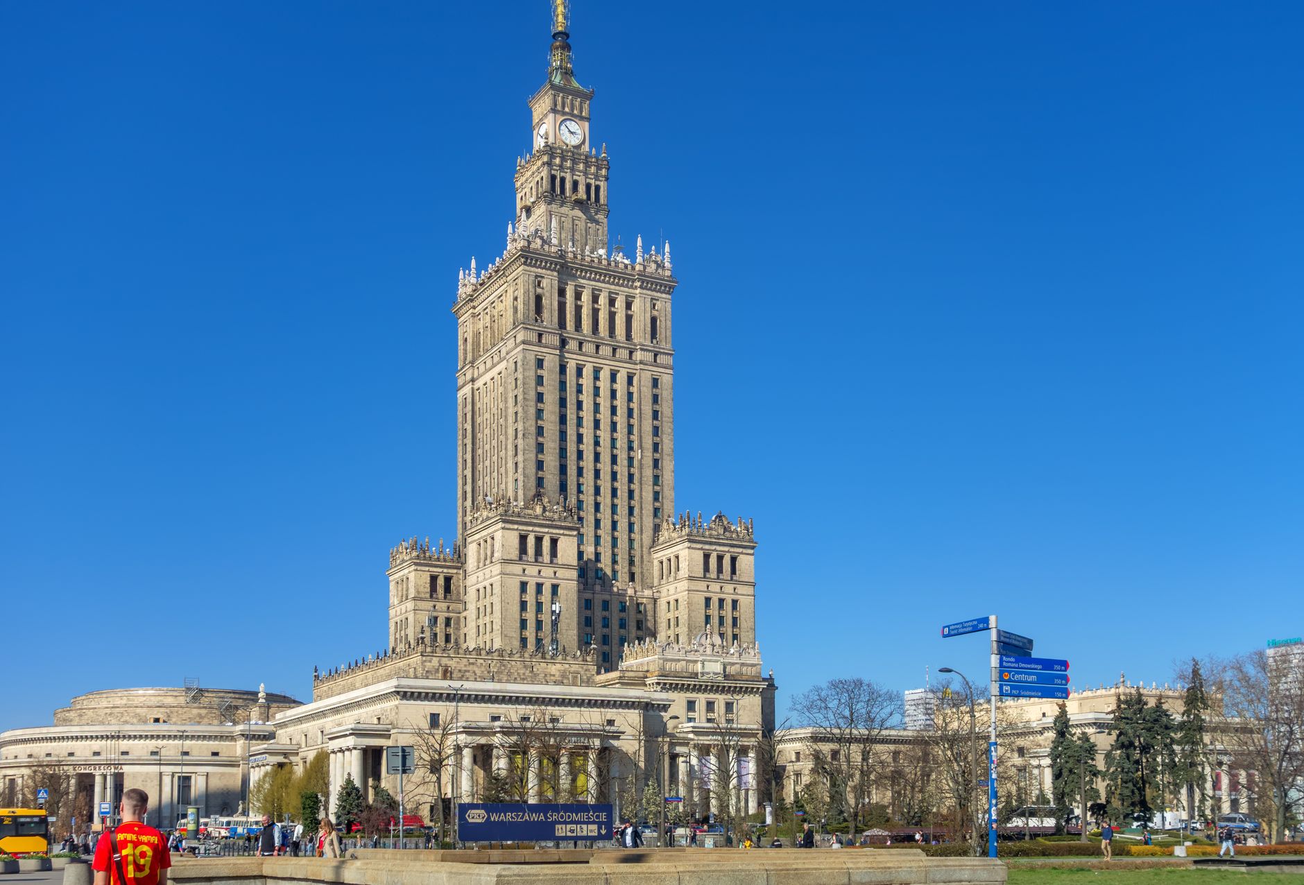 Palace of Culture and Science under a clear blue sky in Warsaw, Poland.