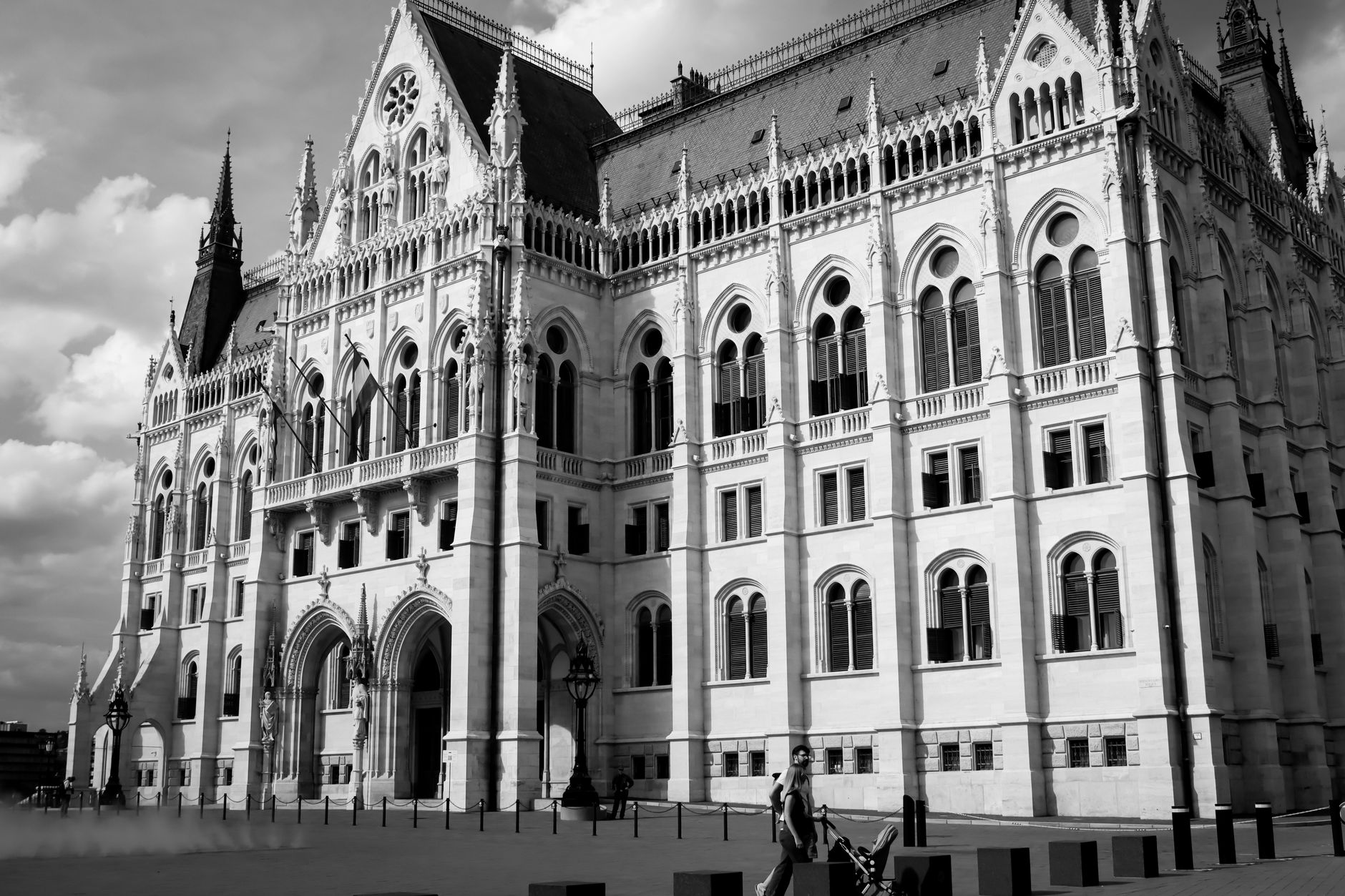Striking black and white image showcasing the gothic architecture of the Hungarian Parliament Building in Budapest.