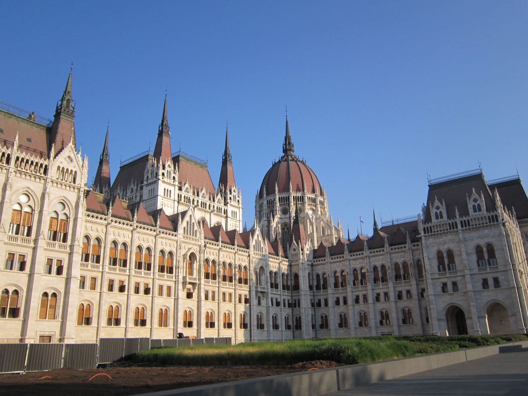The iconic Hungarian Parliament Building in Budapest, captured on a bright summer morning.