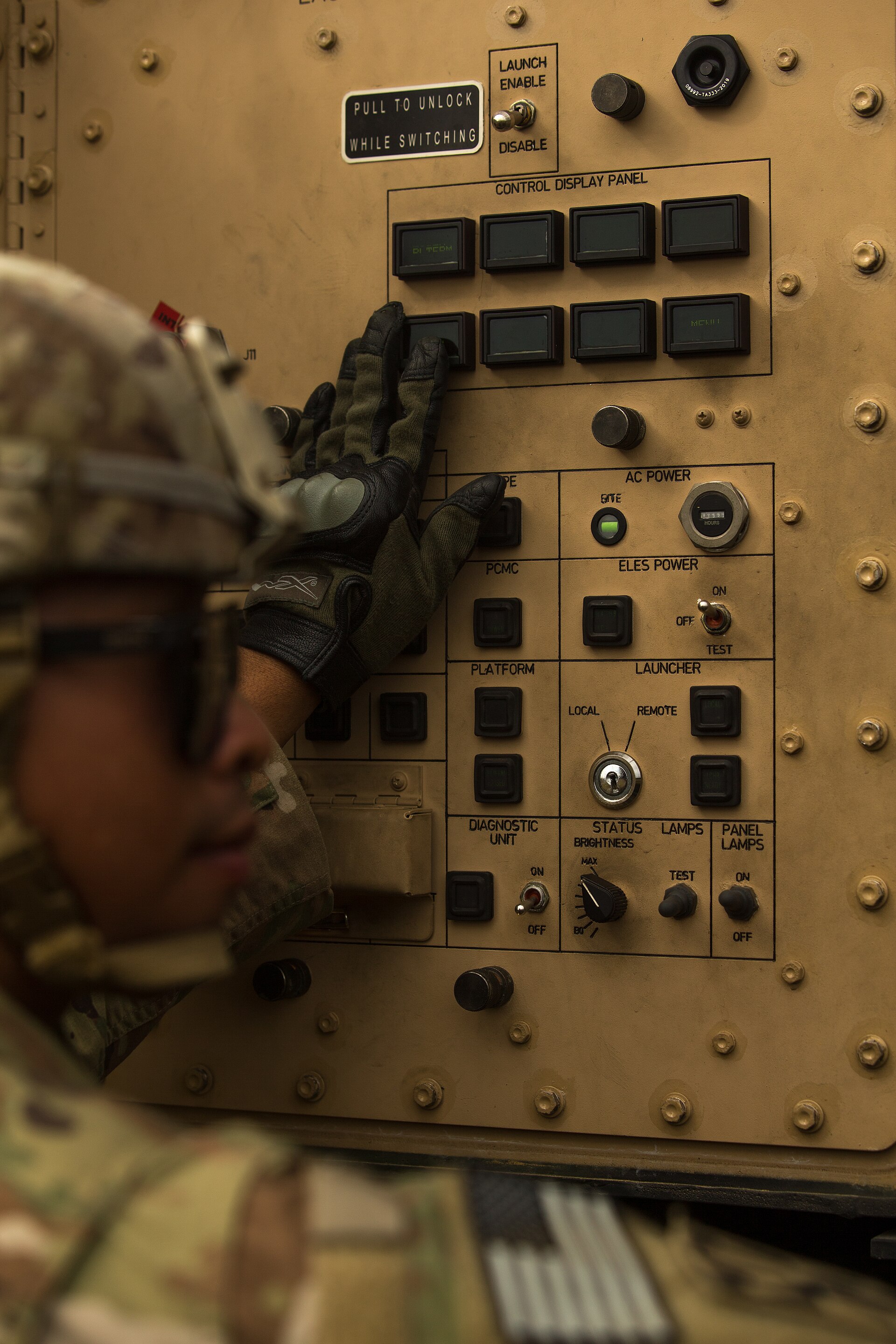 U.S. Army Sgt. Tamayo Ezekiel, an Army Patriot Launching Station Enhanced Operator section chief, finds the MIM-104 Patriot address and turn